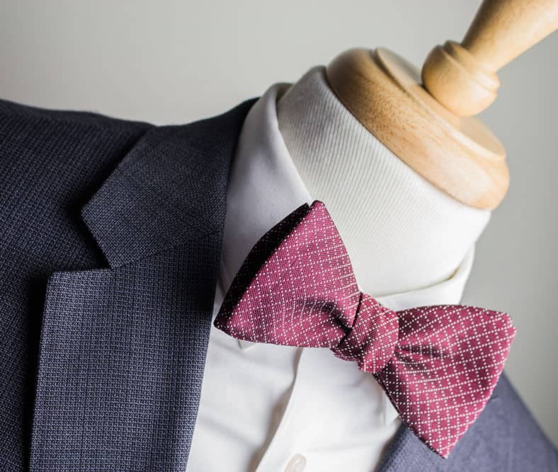 bow tie with charcoal suit and burgundy bow tie