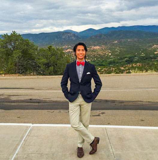 Navy Jacket, Khaki Pants, And Red Bow Tie