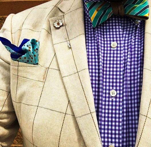 Herringbone Suit Jacket, Gingham Shirt, And Striped Bow Tie