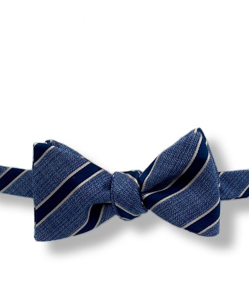 Aberdeen-blue-striped-silk-wool-self-tie-bow-tie that is shown tied