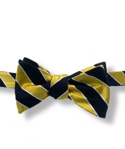 black and gold striped silk self tie bow tie that is shown tied