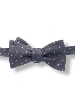 gray silver polka dot silk bow tie that is self tie and shown tied