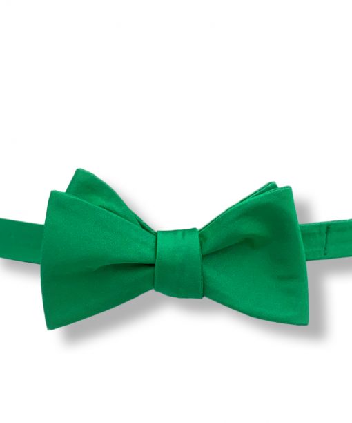 green silk bow tie that is self tie and shown tied