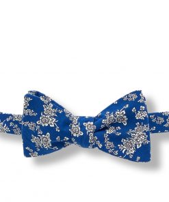 kircaldy-blue-floral-cotton-self-tie-bow-tie that is shown tied