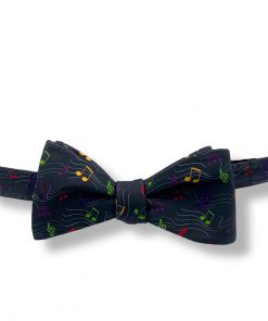 a bow tie with music notes pattern in charcoal gray color this is self tie and show tied