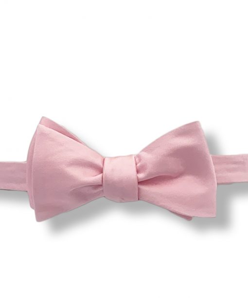 pink silk bow tie that is self tie and shown tied