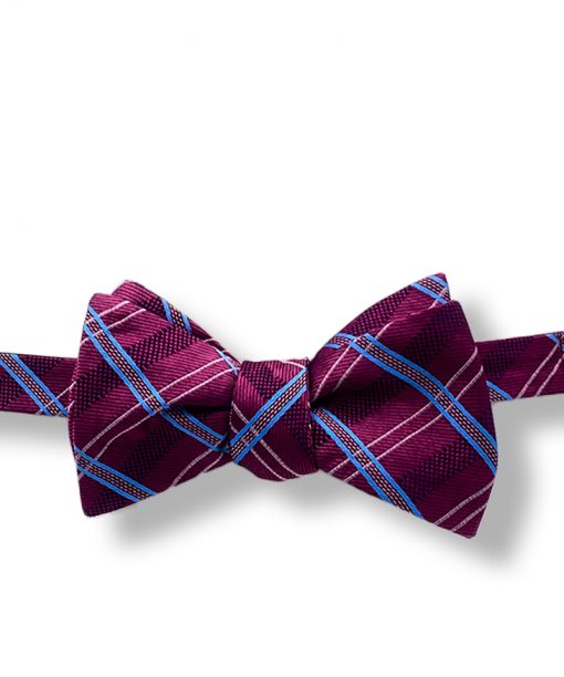 purple plaid silk bow tie that is self tie and shown tied