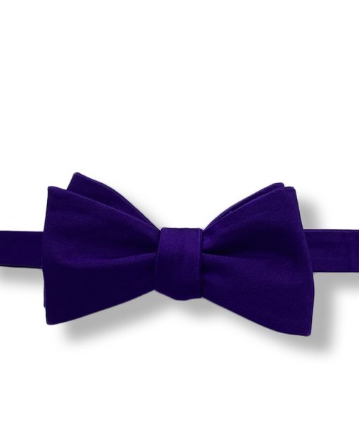 purple silk bow tie that is self tie and shown tied